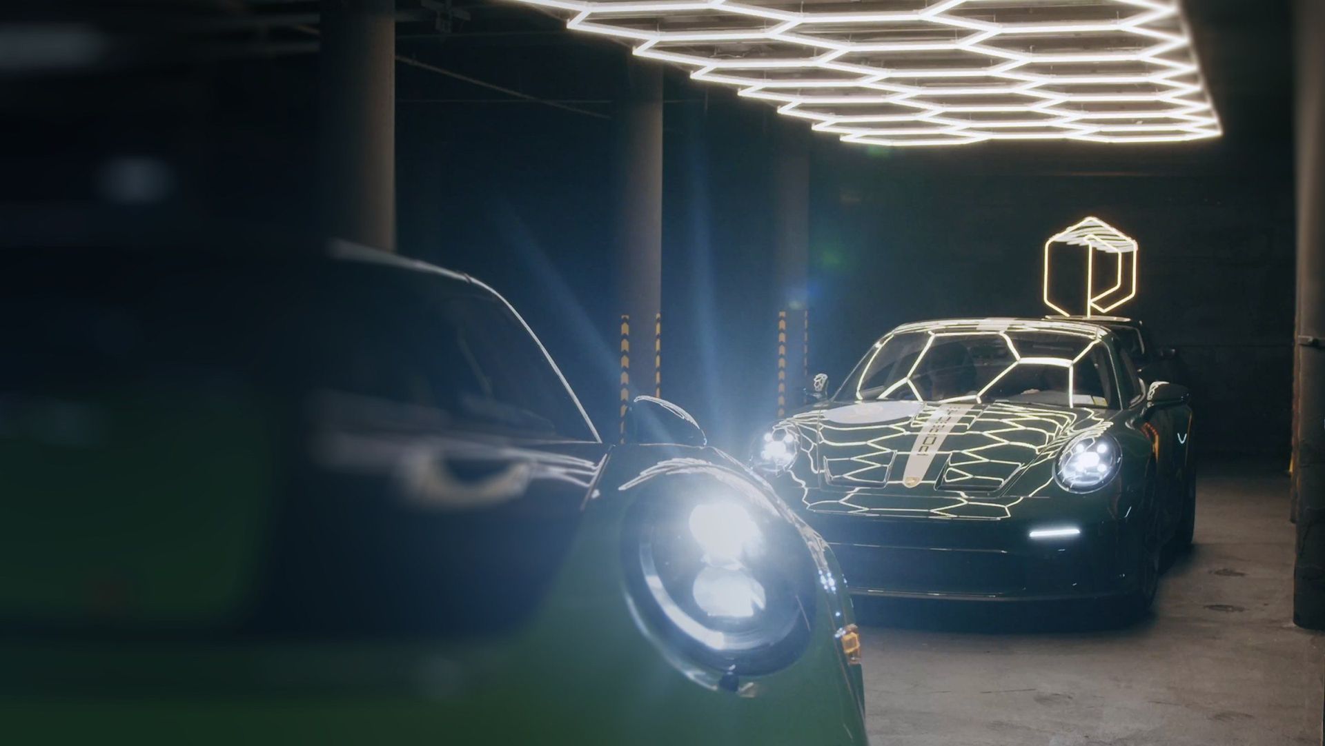 A car under Paddock’s hexagonal light ceiling, the P mark above it
