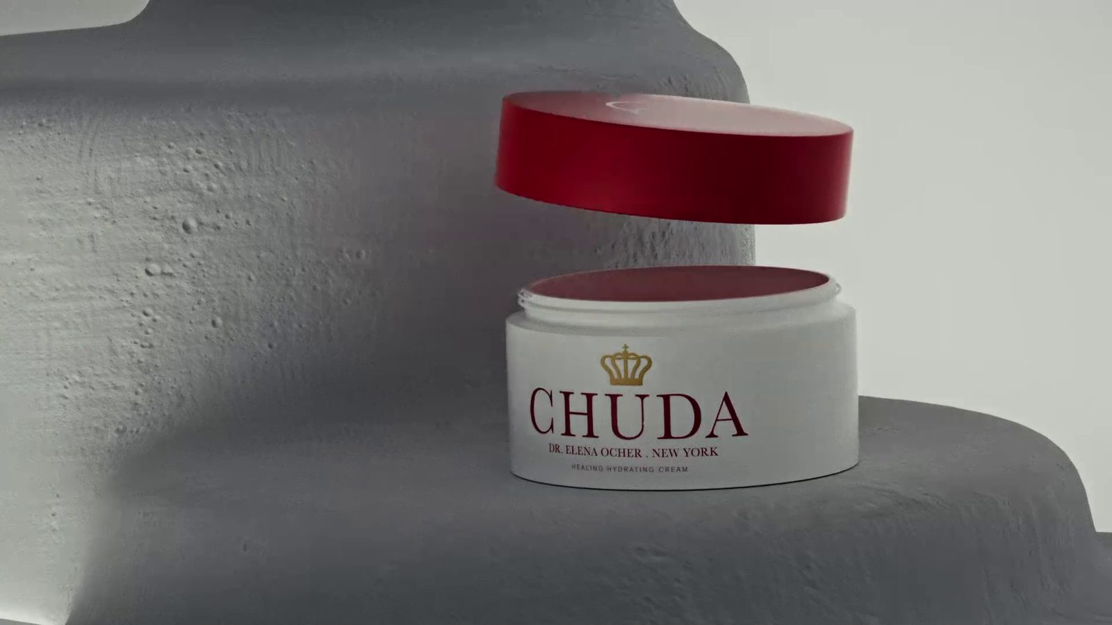 The red lid in the air above the open Chuda jar, the label whole: Chuda, Dr. Elena Ocher, New York